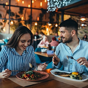 a couple on a date at a restaurant