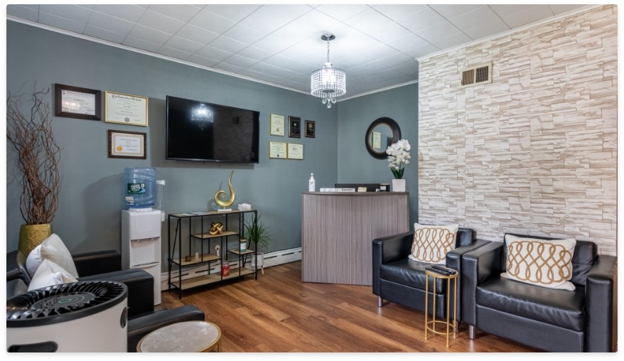 Dental office reception area with calming light blue walls