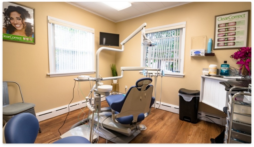 Dental exam room with ClearCorrect posters on the walls